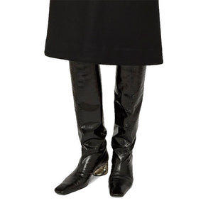 Spliced sleeve high boots